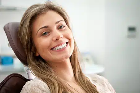 Young girl's happy smile after dental work