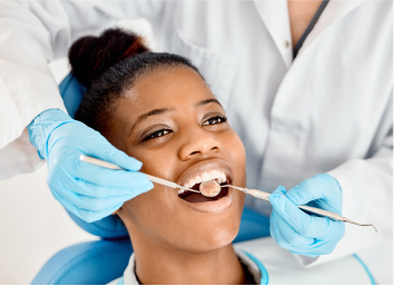 Dentist doing exam on women